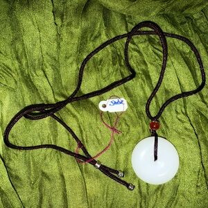 White silk jade donut Pendant Necklace with Brown cord